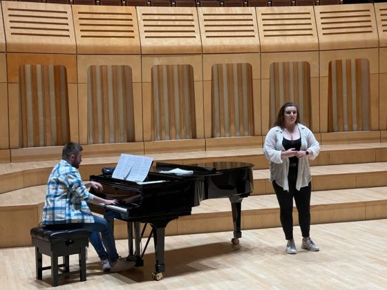 Erin rehearses for the competition with her accompanist on the Steinway grand piano in the Dora Stoutzker Hall
